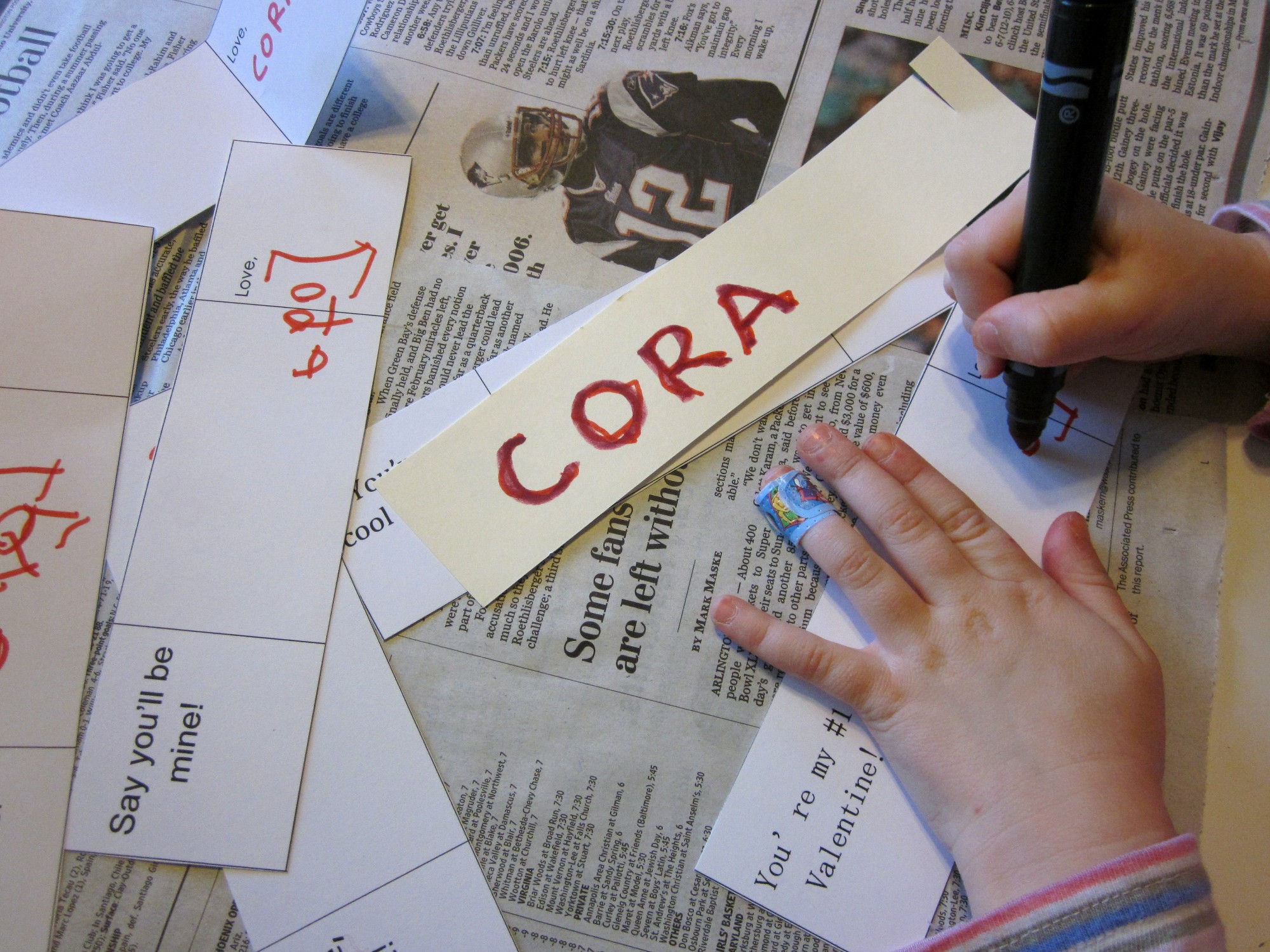 Cora practices her name