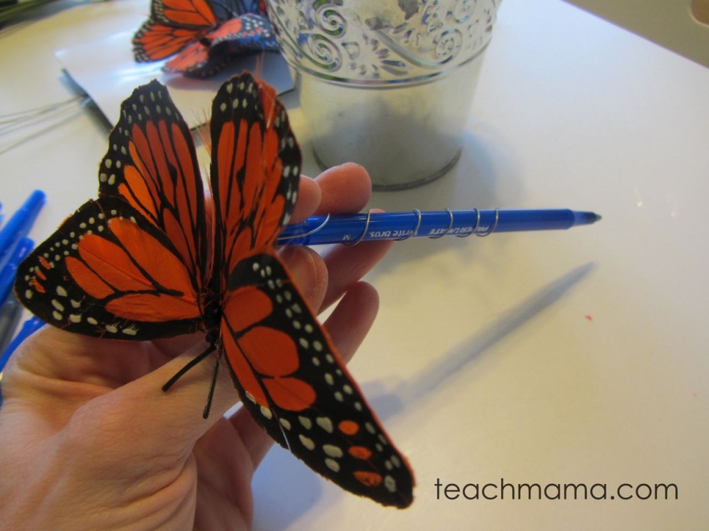 butterfly on a blue pen