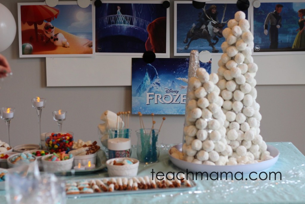 frozen birthday party tower and snacks on table