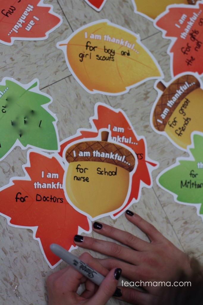 acorn and leaf cutouts with thankful messages on them