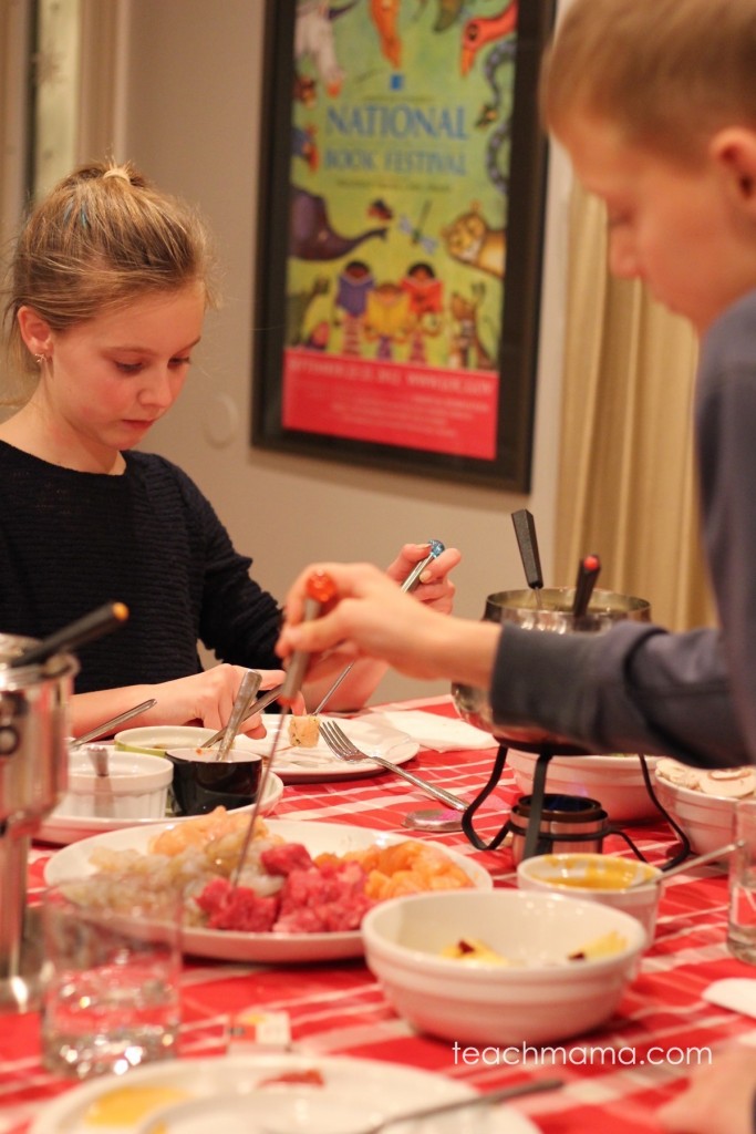 kids poking meat for fondue