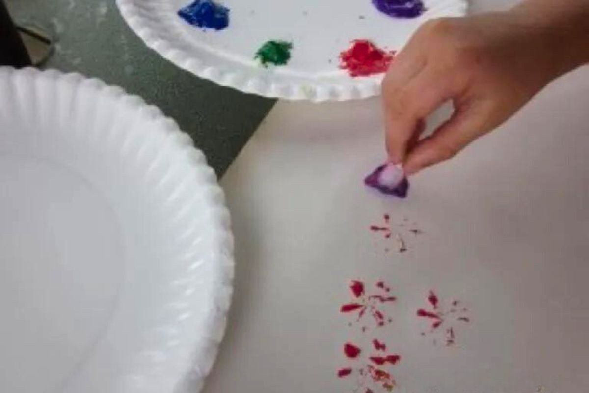 using a flower as a paintbrush