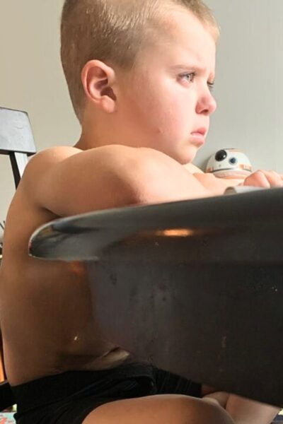 Worried looking boy at desk