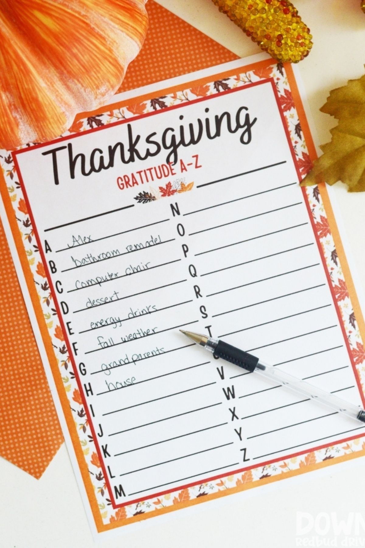 Printed Thanksgiving Gratitude A to Z list with fall color leaves and outline for the border