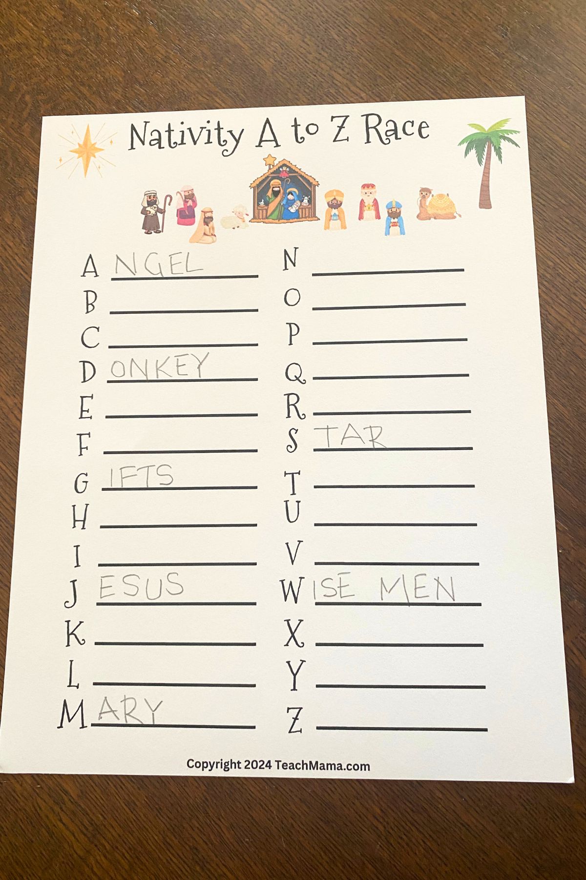 Printed Nativity A to Z Race with the alphabet and lines to write in in two columns on the page