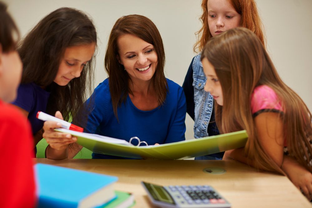 Teacher teaching kids