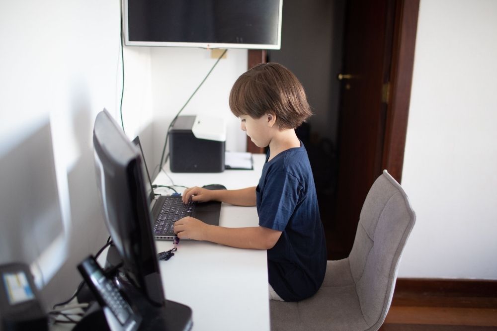 Kid in a computer table