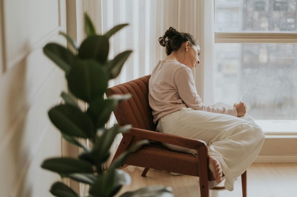 Woman bored in the house